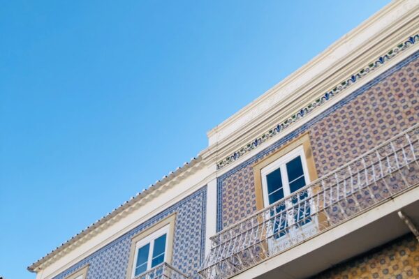 beige and brown concrete building under blue sky during daytime