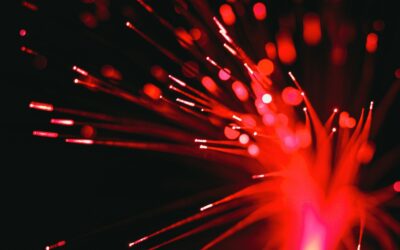 A close up of a red and black firework